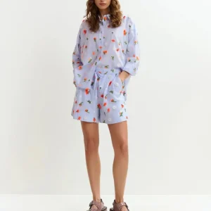 Camicia Jimena azzurra manica lunga con fiori paillettes