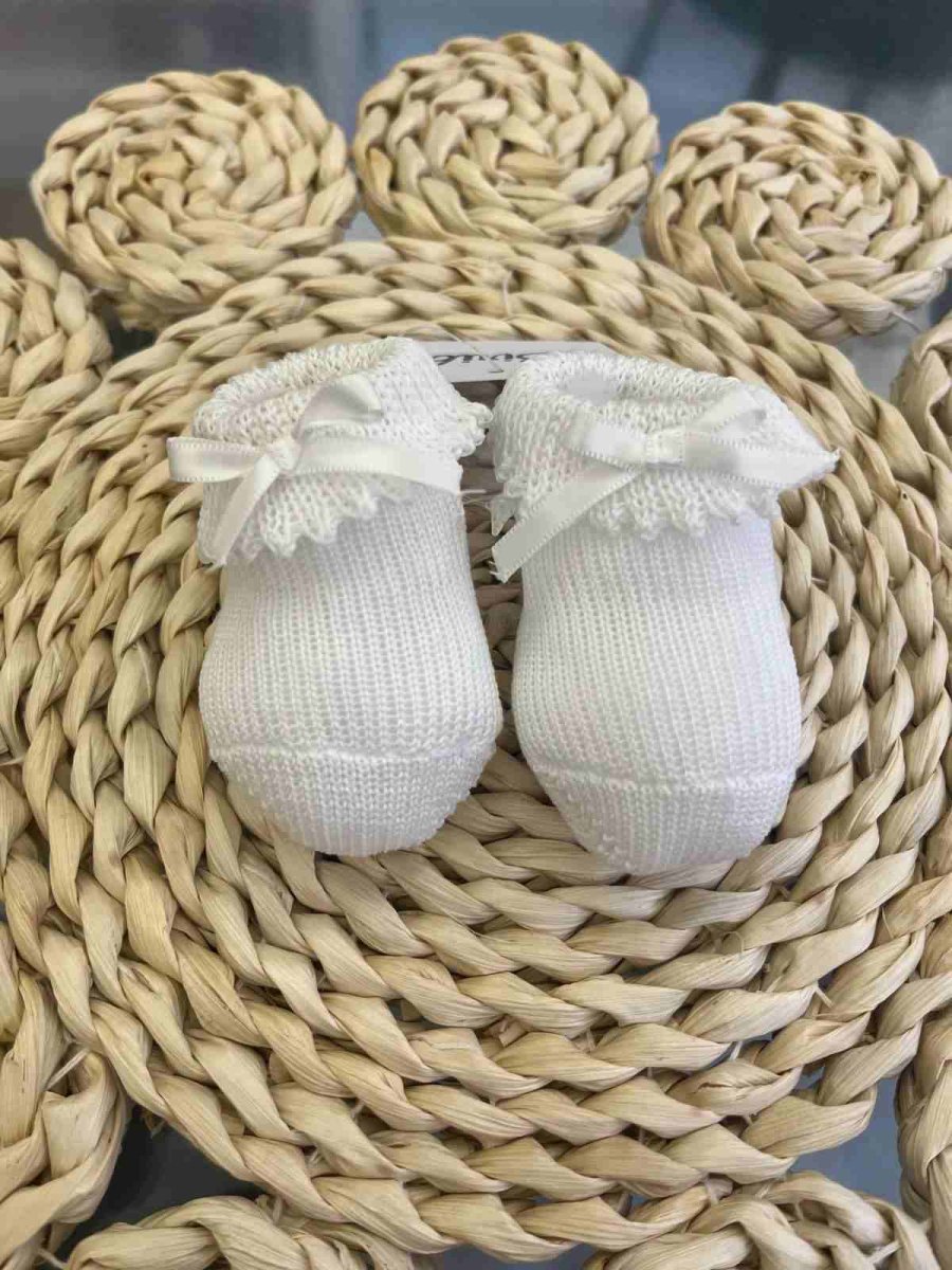 Babbucce bianche con fiocchettino