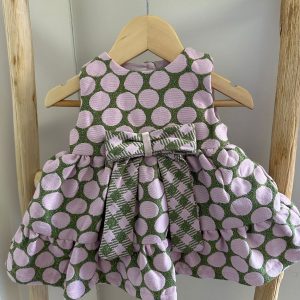 Vestito verde a pois rosa con fiocco