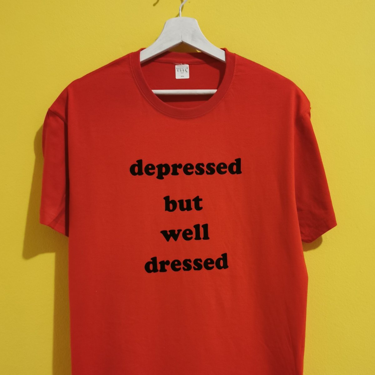 DEPRESSED BUT WELL DRESSED